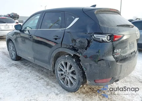 2021 Mazda Cx-5 Grand Touring z USA, uszkodzony, nr VIN JM3KFBDM3M1477254